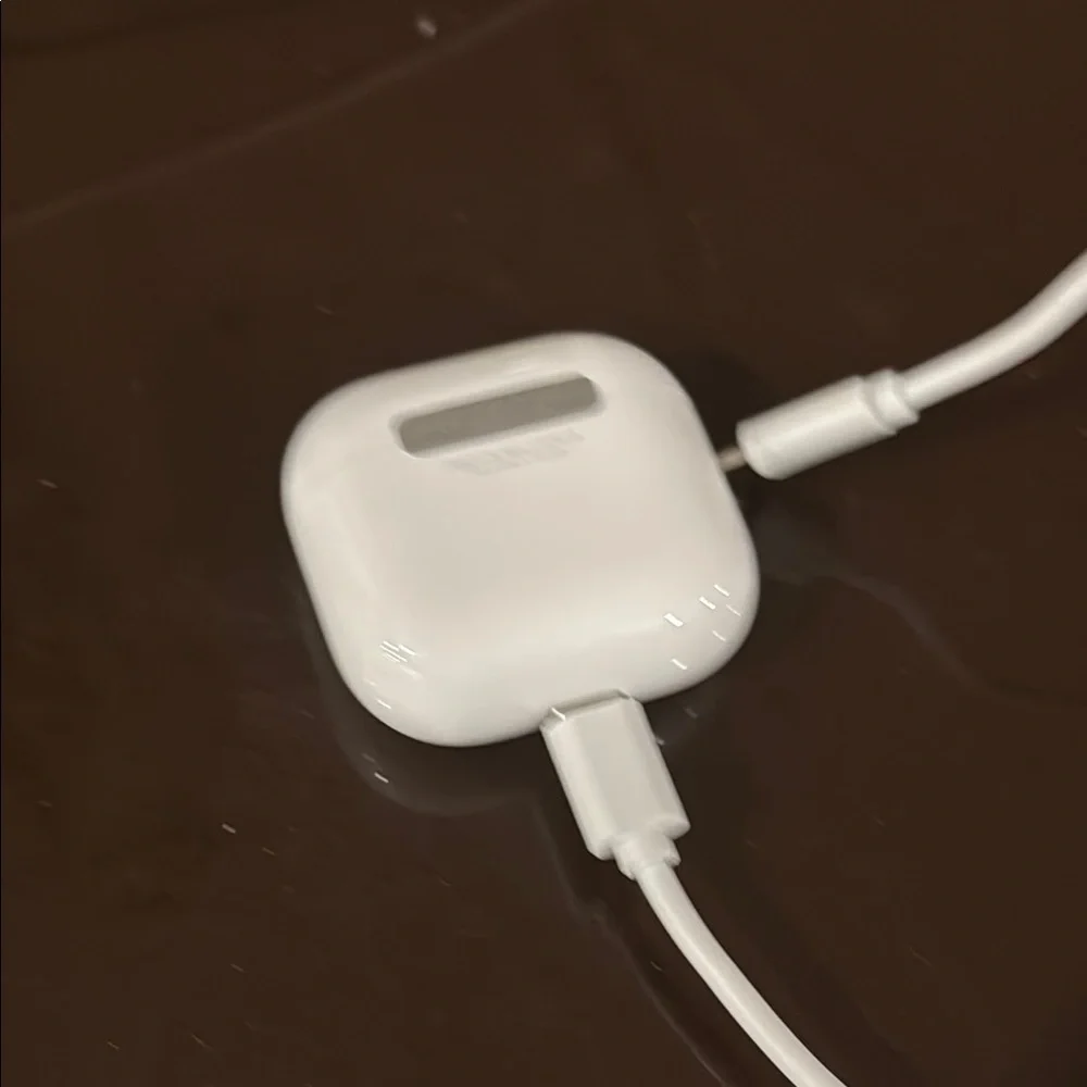 Apple AirPods Wireless Earbuds with Charging Cable
